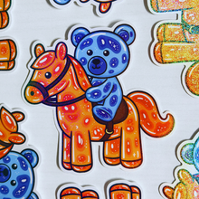 Load image into Gallery viewer, Glitter Horseriding Jelly Teddy Bear
